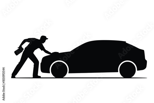 Silhouette of a man cleaning and polishing a car surface