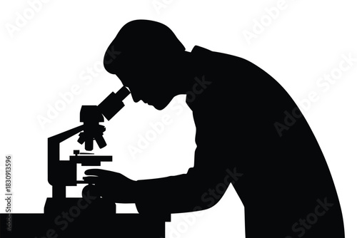 Silhouette of scientist examining sample under microscope in laboratory setting