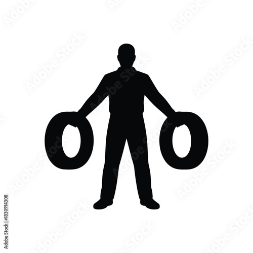Silhouette of a man holding two large circular objects outward