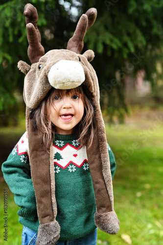 Toddler girl in deer hat