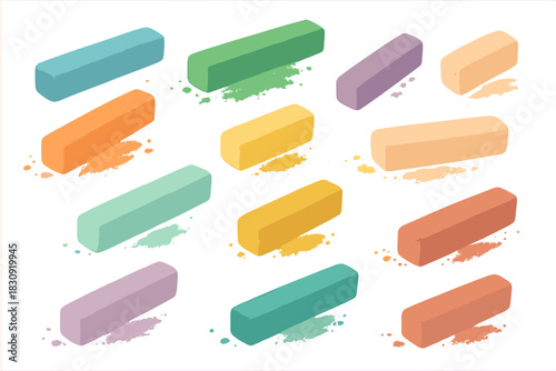 Twelve colorful art pastels or drawing chalks arranged in a pattern with scattered pigment dust