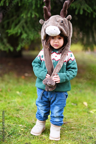 Toddler girl in deer hat