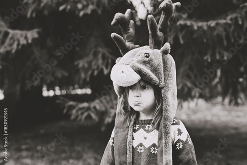 Toddler girl in deer hat