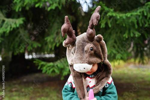Toddler girl in deer hat
