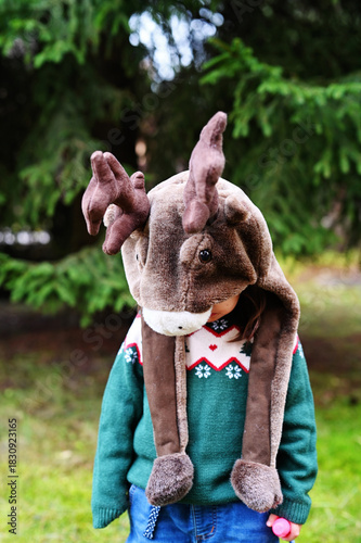 Toddler girl in deer hat