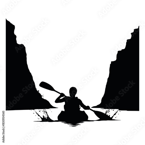 Silhouette of a person kayaking through a narrow canyon with water splashing