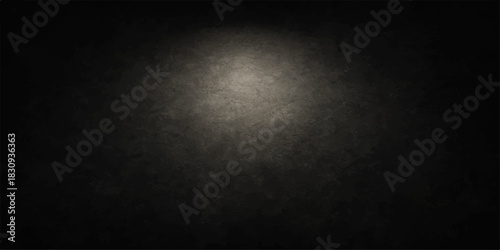 Dark old textured grunge wall surface with a spotlight, perfect for vintage black concrete paper pattern design wallpaper backdrop