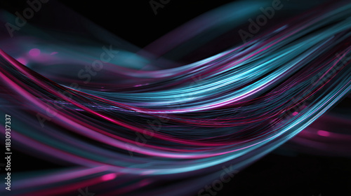 Abstract, flowing lines of blue and purple light against a black backdrop. The image creates a sense of movement and energy