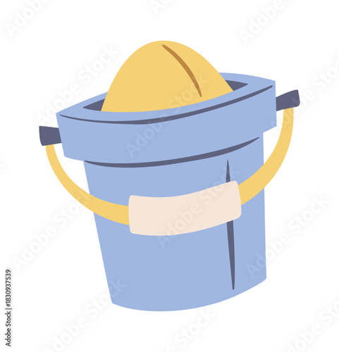 Toy bucket filled with sand