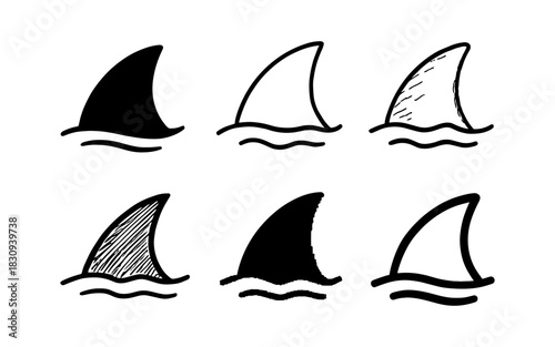 Hand drawn shark fins: diverse doodle set of ocean predators in black and white