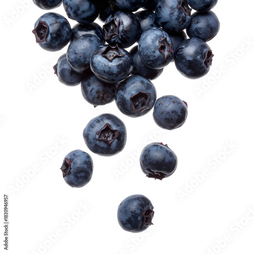 Fresh Blueberries Spilling From a Small Pile Onto a Clean Surface