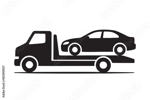 Black silhouette of a tow truck carrying a car isolated on white background