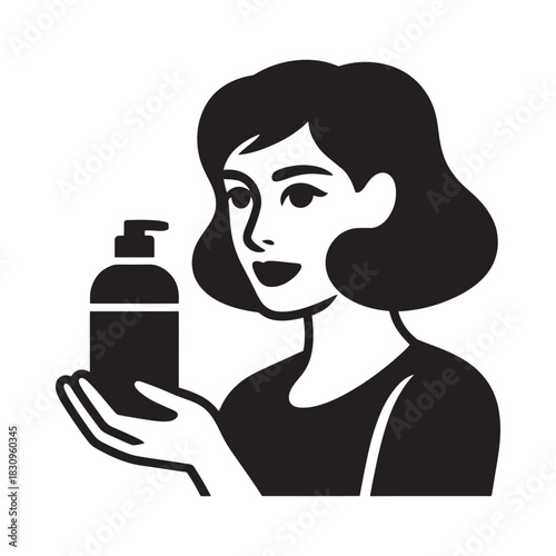 Woman holding a pump bottle of lotion or soap