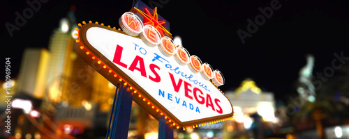 Welcome to Fabulous Las Vegas Sign at Night With Blurred Hotels in the Background. Logo Removed from the Sign