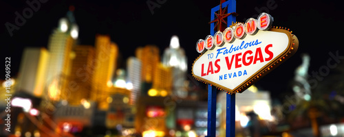 Welcome to Fabulous Las Vegas Sign at Night With Blurred Hotels in the Background. Logo Removed from the Sign