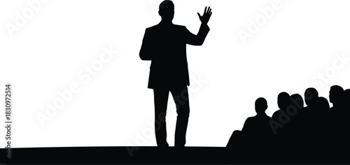 silhouette of a man addressing something 