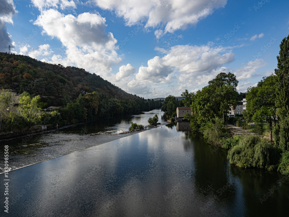 Fototapeta premium The Lot River as it flows through the medieval city of Cahors. Lot Valley, Ocitanie Region, France.