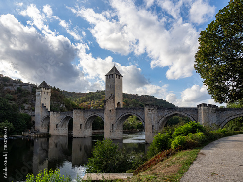 View of the Valentrén bridge, in the medieval city of Cahors, over the Lot River. Lot Valley, Ocitanie Region, France.