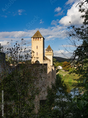 View of the Valentrén bridge, in the medieval city of Cahors, over the Lot River. Lot Valley, Ocitanie Region, France.