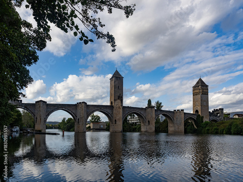 View of the Valentrén bridge, in the medieval city of Cahors, over the Lot River. Lot Valley, Ocitanie Region, France.