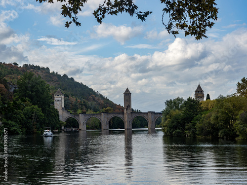 View of the Valentrén bridge, in the medieval city of Cahors, over the Lot River. Lot Valley, Ocitanie Region, France.
