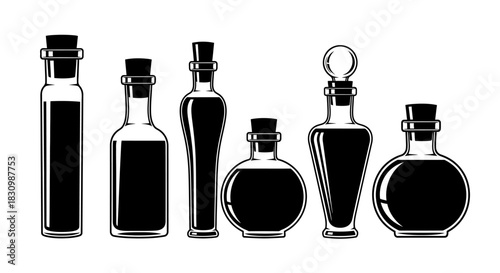 Variety of vintage stylized liquid bottles with corks and stoppers