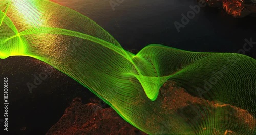 Sun reflection rising, green ribbon mesh sweeping, tightening, looping and revealing coastal cliffs