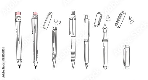 Assorted Drawing implements in black and white, various pens and pencils are aligned