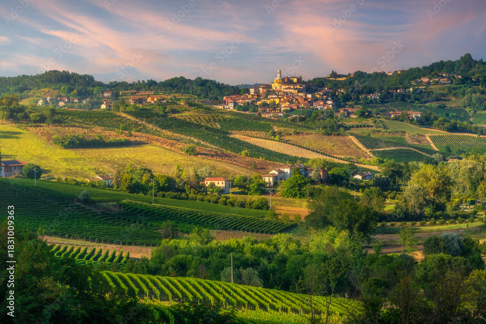 Obraz premium Sunset Over Langhe and Monferrato Vineyards and Montegrosso d'Asti village