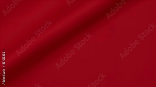 A luxurious red fabric with subtle folds and a soft sheen,  creating an elegant and inviting texture suitable for backgrounds and designs