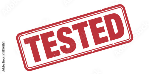A red tested stamp with a white background indicating successful evaluation result