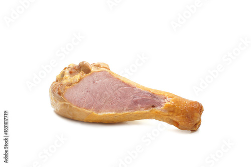 Smoked cut chicken leg, isolated on white background. Сlose up.