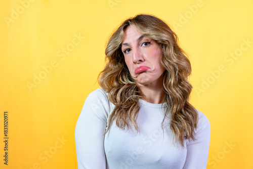 Canvas Print Woman pouting with a sad expression feeling displeasure