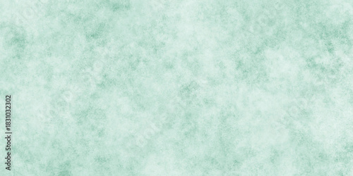 Abstract Elegant dark green background with mottled vintage texture in old fancy background design, texture of colored parchment paper.	