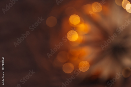 abstract brown background with gold bokeh