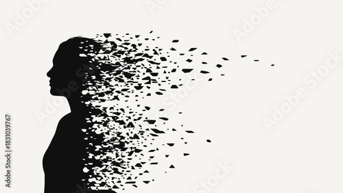 Silhouette of a womans head dissolving into fragments