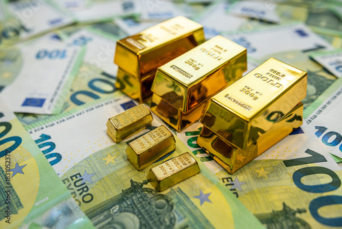 Euro notes and gold bullion showing economic value, currency market and investment balance