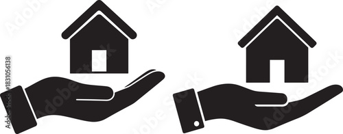 Two hands holding houses silhouette