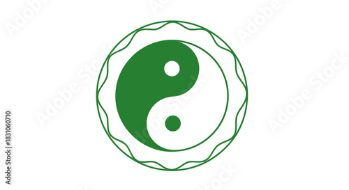 Green and white yin yang symbol in decorative circle representing balance and harmony concept