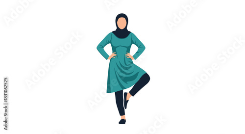 Confident Muslim woman wearing a stylish hijab and modest teal clothing standing in a proud and empowered pose.