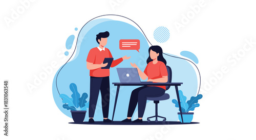 Two colleagues discussing work in an office setting one standing and one sitting at a laptop promoting teamwork.