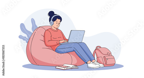 Young woman with headphones sits comfortably in a pink beanbag chair studying or working remotely from home on her modern laptop.