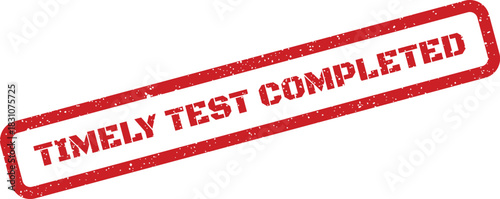 A rectangular red rubber stamp mark with a textured grunge effect displaying the phrase TIMELY TEST COMPLETED for official records