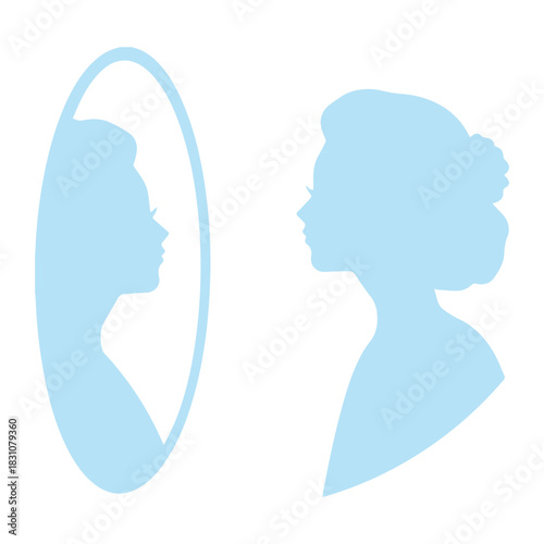 Woman Looks in Mirror