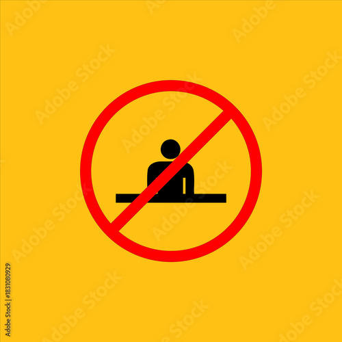 No sitting allowed sign with a person behind a desk in a red circle with a diagonal line.