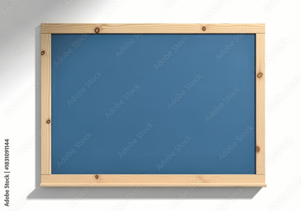 Fototapeta premium Blank blue chalkboard with wooden frame on white background 