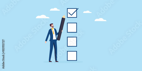 Businessman checking off a task on a checklist with a pencil