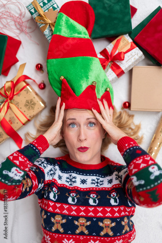 Woman feeling stressed about holiday gift preparations