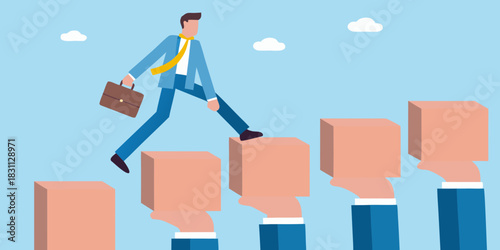 Businessman climbing steps made of boxes held by hands