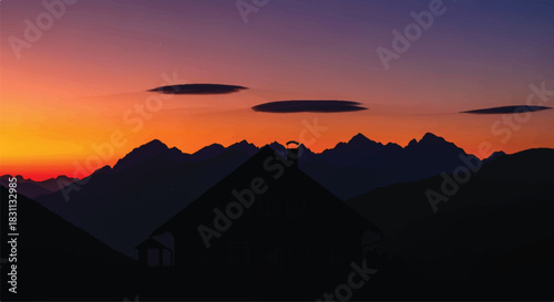 Silhouette of a Building Against a Vibrant Sunset Sky.